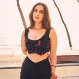 Kusha Kapila in the Noir draped skirt